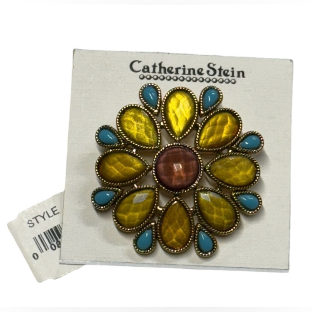 Catherine Stein brooch NWT. Pretty blue and yellow flower with brown center.